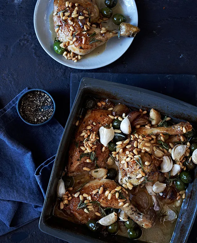 Chicken braised in vinegar with confit garlic, rosemary and pine nuts