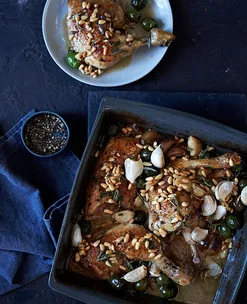 Chicken braised in vinegar with confit garlic, rosemary and pine nuts