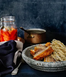 Slow-roasted spiced pork with pickled quince and celeriac rémoulade
