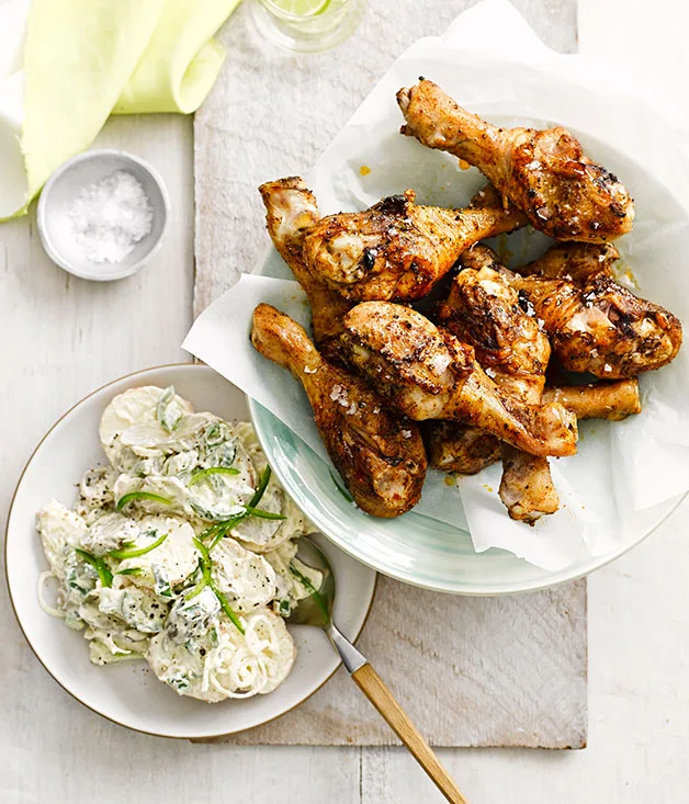 Spiced drumsticks with potato and pickle salad