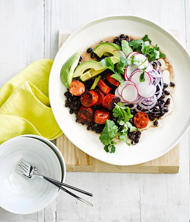 Grilled chorizo with black bean and avocado salad