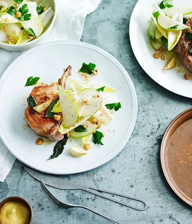 Roast pork cutlets with pear, witlof and hazelnut salad