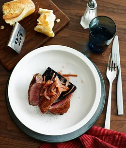 Roast duck with boudin noir and pickled rhubarb