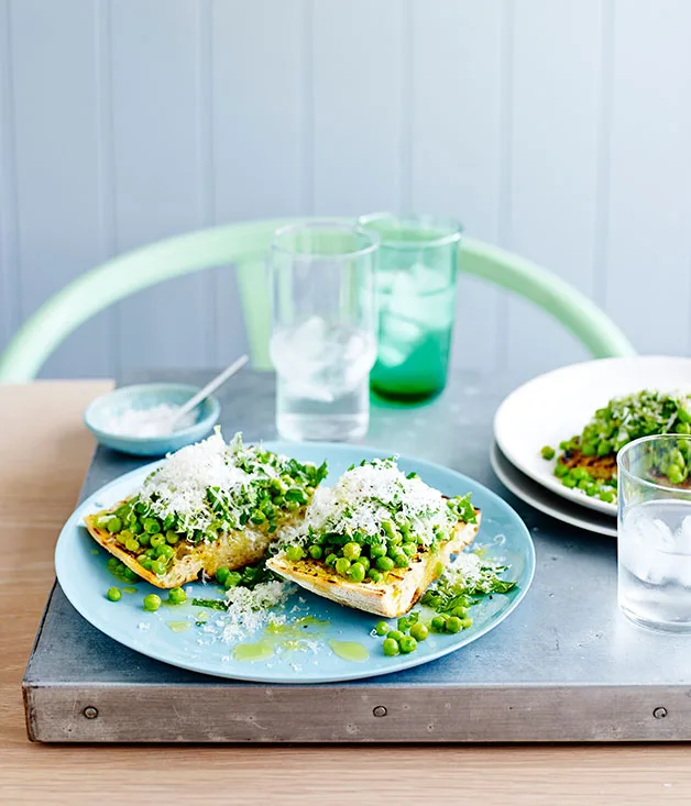 Smashed peas with mint, lemon and pecorino on bruschetta