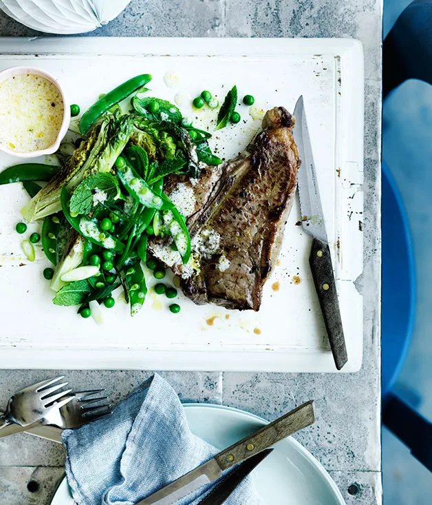 T-bone steaks with barbecued lettuce and peas