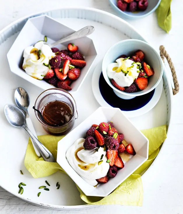 Berries with honey caramel and pistachios