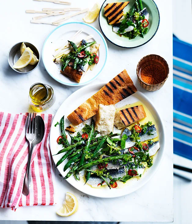 Marinated sardines with garlic and lemon and grilled beans