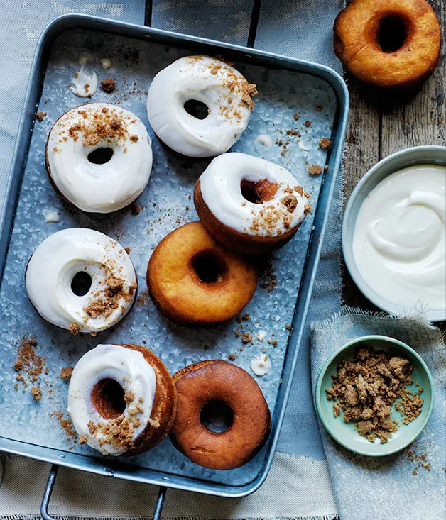 Carrot doughnuts with cream cheese glaze and brown sugar crumb