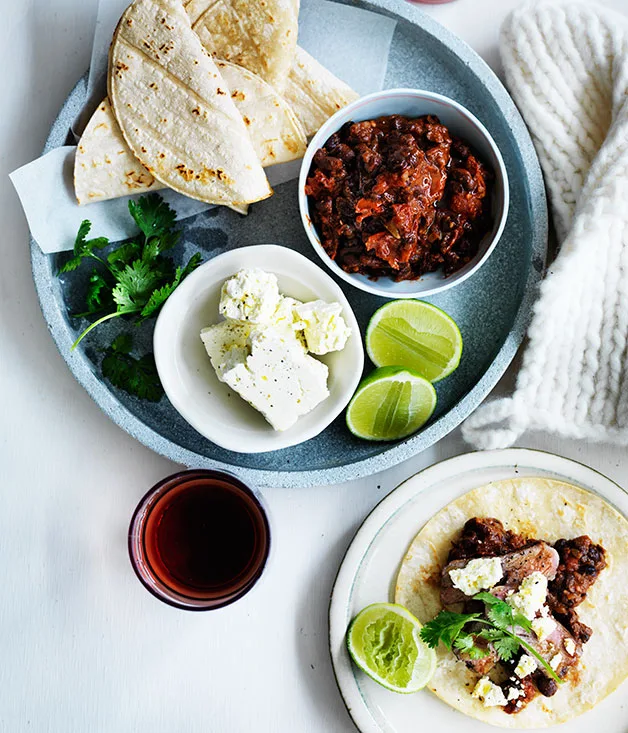 Soft tacos with black bean mole and flank steak