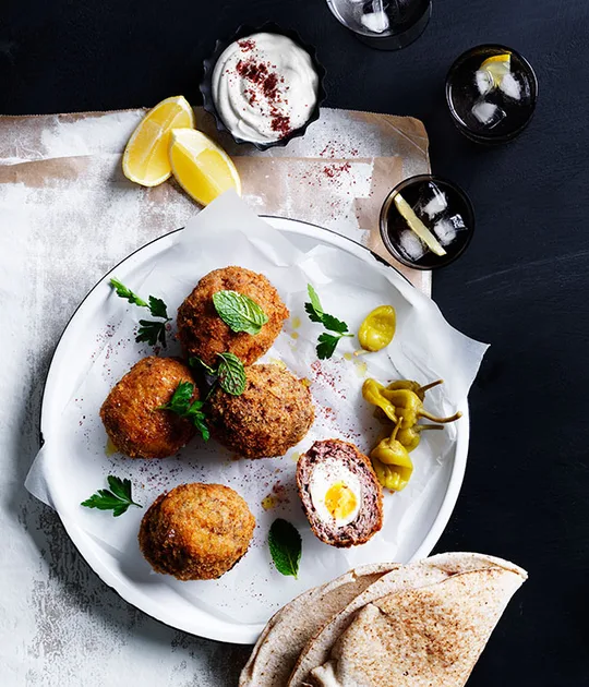 Middle Eastern Scotch eggs with tahini yoghurt recipe | Gourmet Traveller
