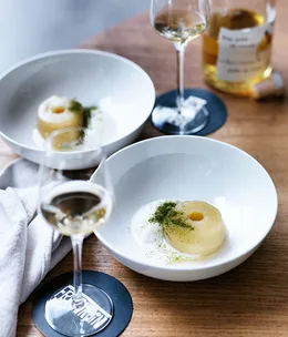 Poached apple with sweetened goat’s curd and bay leaf