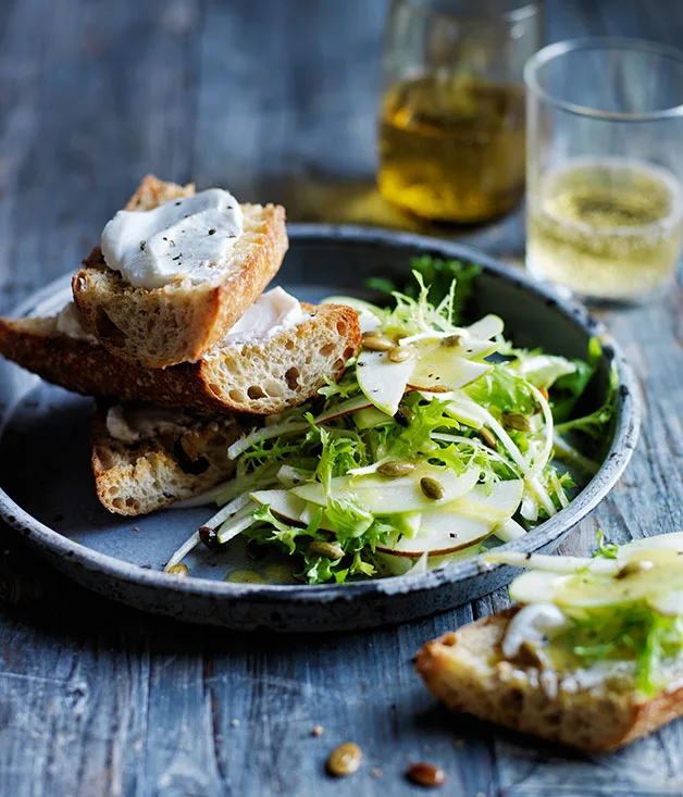 Pear, apple and frisée salad with goat’s curd toasts