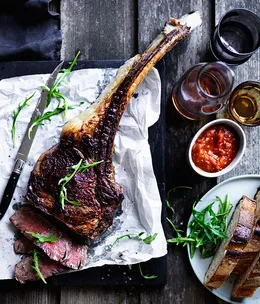Barbecued tomahawk with tomato relish
