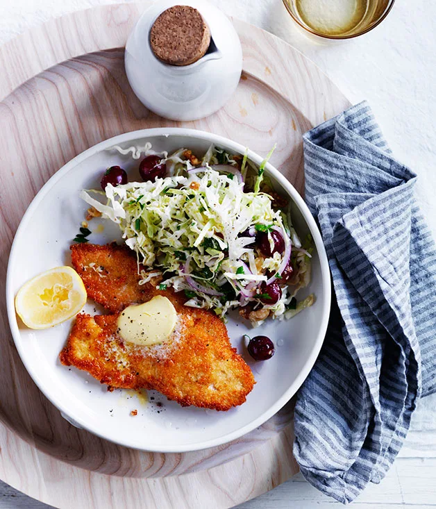 Chicken schnitzels with cabbage and grape salad