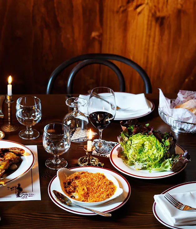 L-R Restaurant Hubert's Kimchi gratin & Red butter lettuce with caper and anchovy vinaigrette