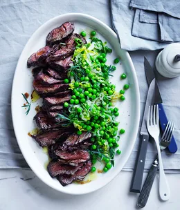 Pepper hanger steak with peas and lettuce