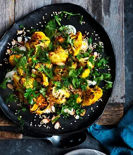 Roasted cauliflower salad with yoghurt dressing and almonds