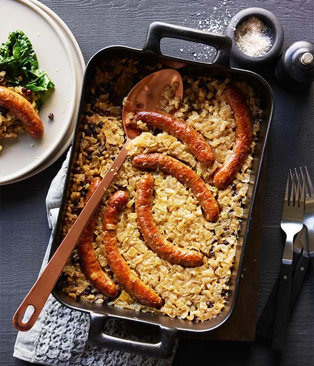 Sausages braised with barley, currants, lemon and silverbeet recipe