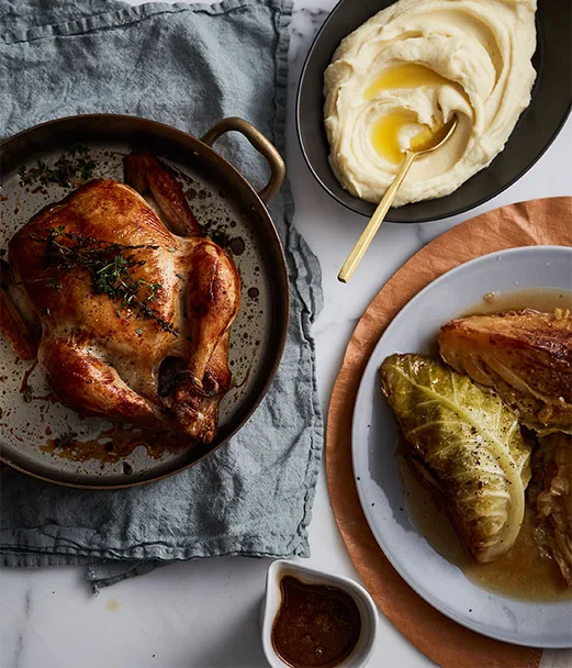 Epocha's roast chicken, braised Savoy cabbage, prune and butter sauce