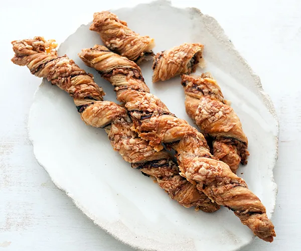 Yu-ching Lee's cheese and Vegemite twists at Sydney's Paper Bird is one example among many of restaurants employing Vegemite to full effect in their dishes.