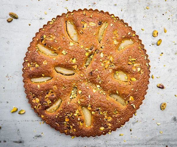Bourke Street Bakery's pear and pistachio love cake, part of the #BakeForSyria cookbook