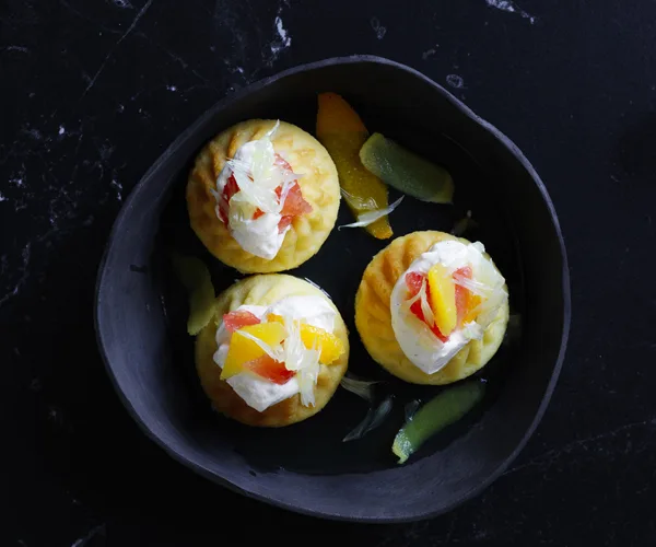 Limoncello baba with vanilla cream