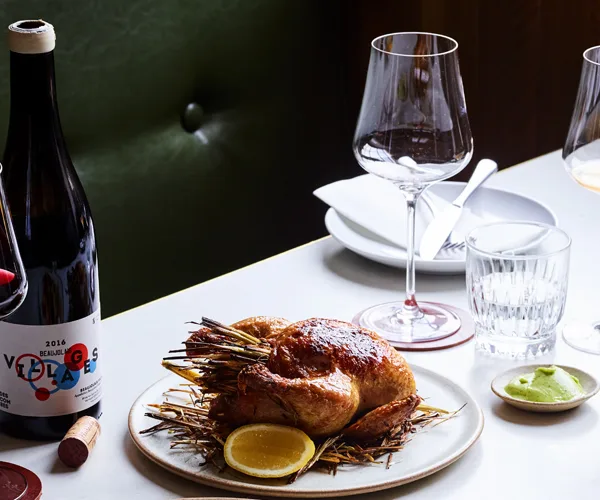 Spatchcock roasted in hay with tarragon butter