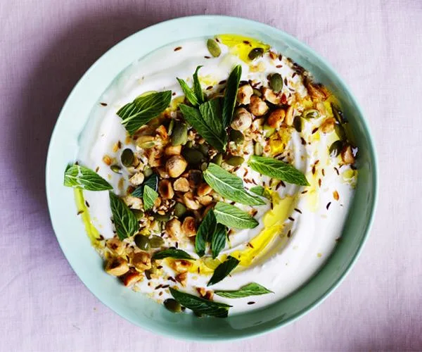 Yoghurt dip with sesame seeds, pepitas, cumin, caraway and mint