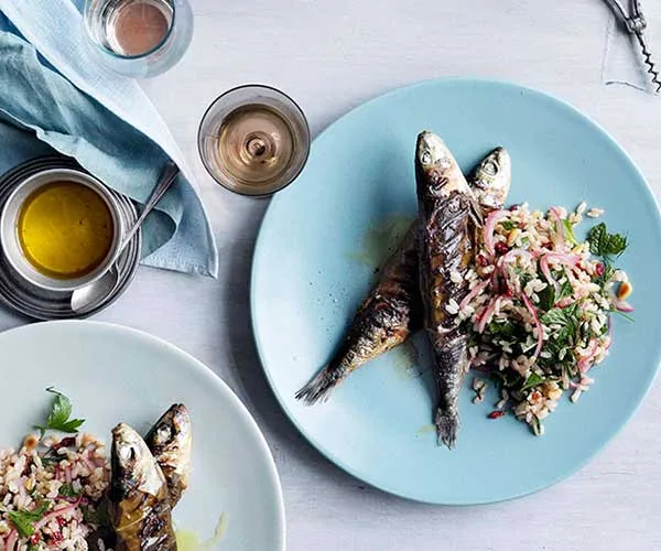 Char-grilled vine-leaf sardines with brown rice, pine nuts and barberries