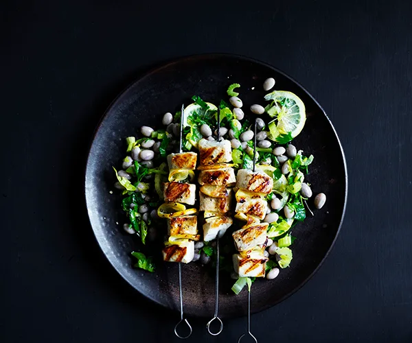 Kingfish skewers with borloui bean and celery heart salad