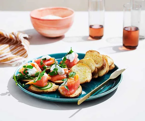 Crostini with smoked trout, dill crème fraîche and cucumber