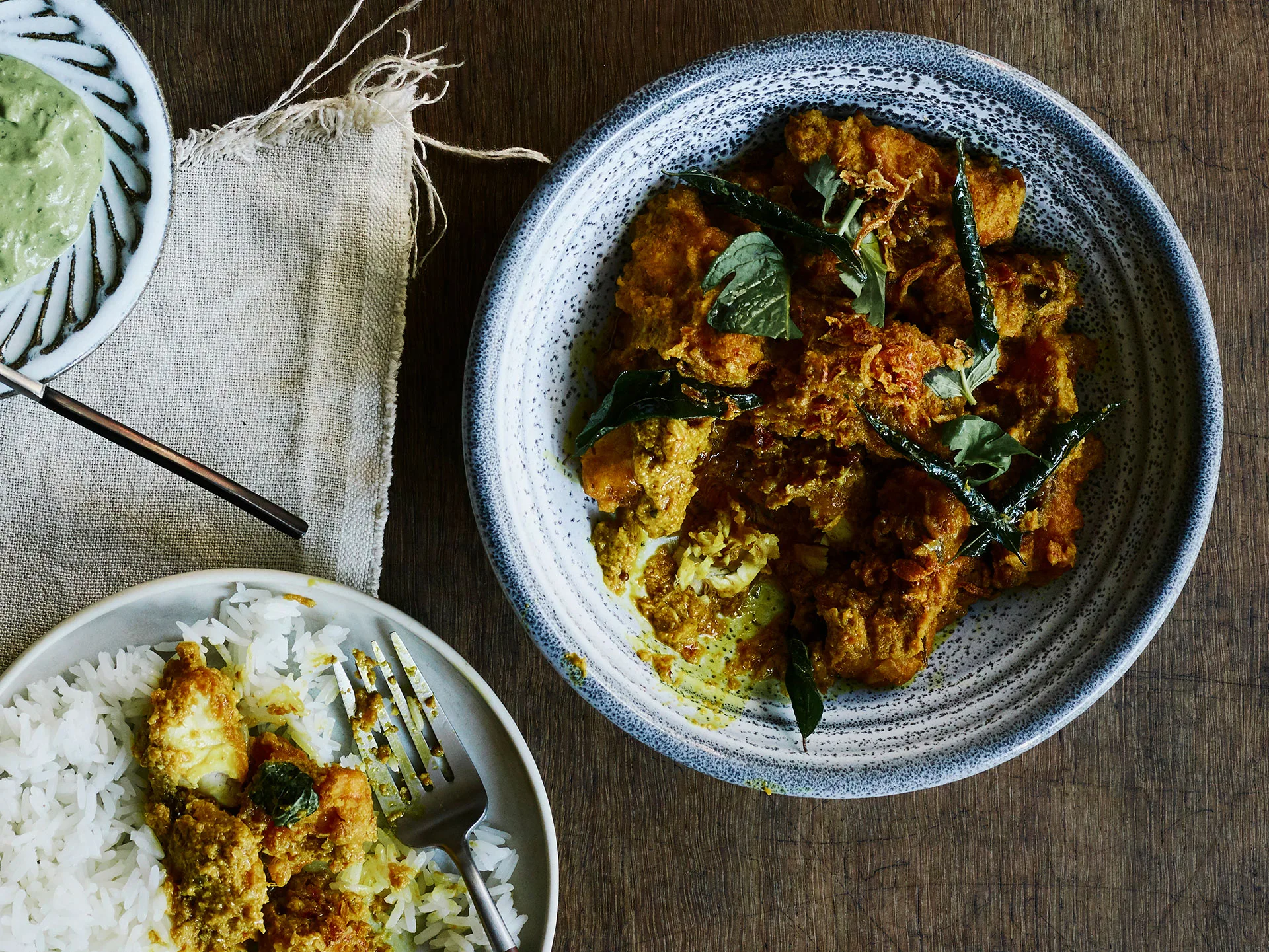 Fish curry with cucumber salad and coriander chutney