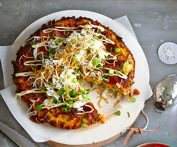 Okonomiyaki with shredded cabbage, daikon and fried noodles