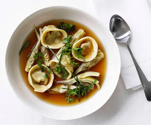 Chicken Brodo with Artichoke Tortellini and Spring Herbs