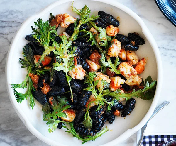 Squid-ink gnochetti Sardi with prawns and ’nduja