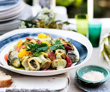 Baked artichokes with citrus and herb salad