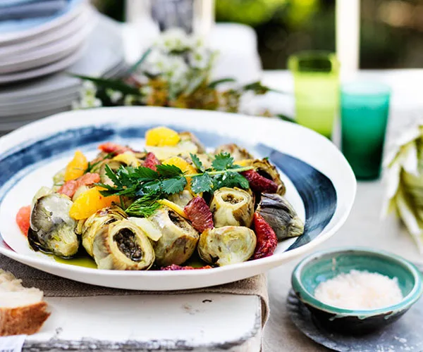 Baked artichokes with citrus and herb salad