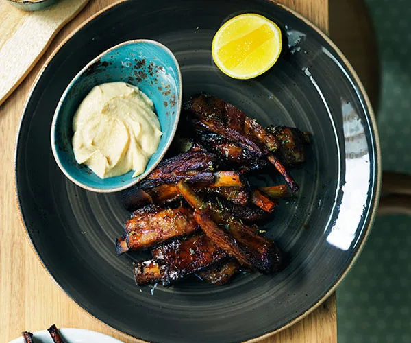 Slow-roasted lamb spare ribs with thyme honey and ouzo glaze