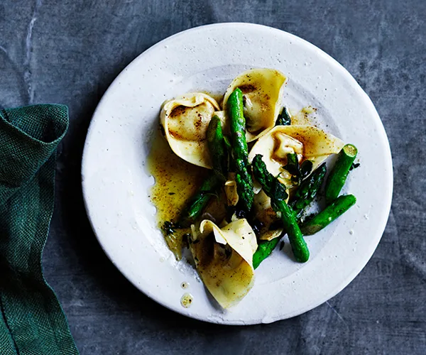 Prosciutto and parmesan cappellacci with brown butter and asparagus