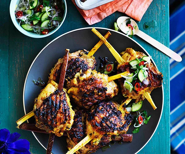 Turmeric and lemongrass chicken on sugarcane