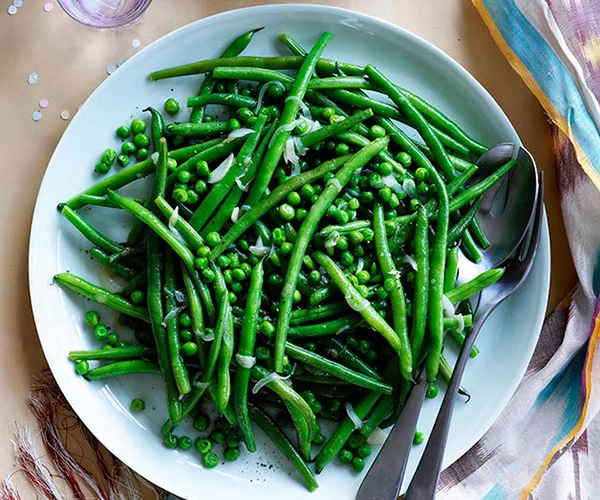 Green beans and peas with garlic and mint crème fraîche