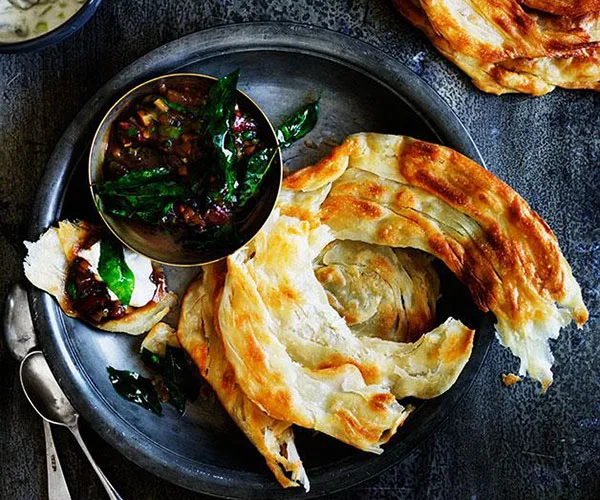 Hot and sour ginger chutney with cucumber yoghurt and roti