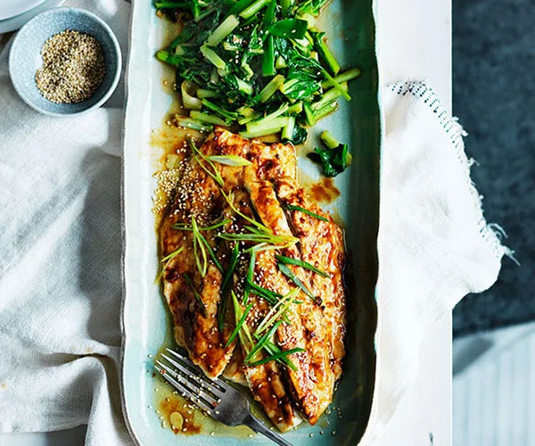 Miso roast mulloway with sesame and sautéed greens