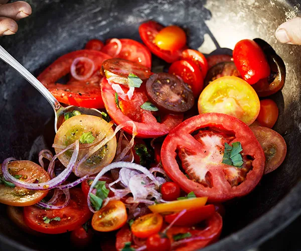 Simple tomato and onion salad with vincotto dressing