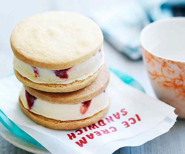 Strawberry ice-cream and fudge sandwiches