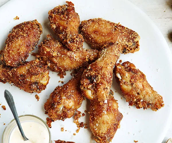 Fried chicken wings with coleslaw milk