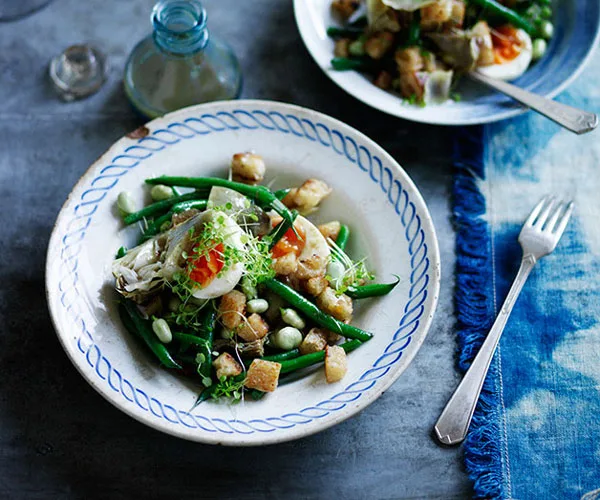 Artichoke salad with green beans, egg and anchovy dressing