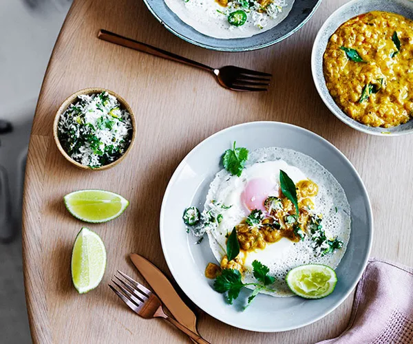 Egg hoppers with green sambol and coconut gravy