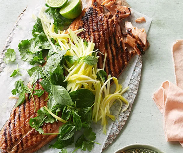 Barbecued ocean trout with green mango and shallot salad