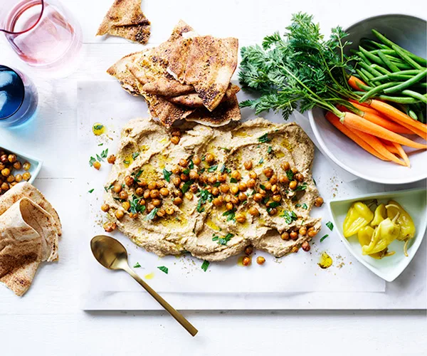 Roasted cauliflower and tahini dip with crudites and flatbread